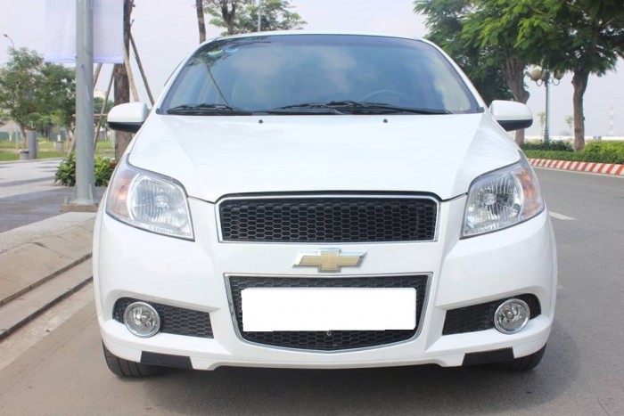 Cần tiền bán Aveo 2014 Ltz đk 2015, số tự động, màu trắng tinh cực đẹp