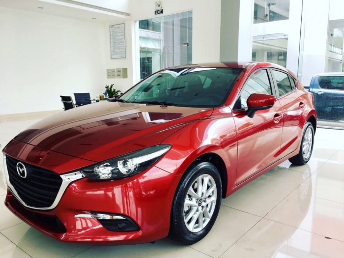 Mazda Bình Dương bán xe Mazda 3 1.5 Hatback màu Đỏ, có hàng giao ngay, trả trước 180tr