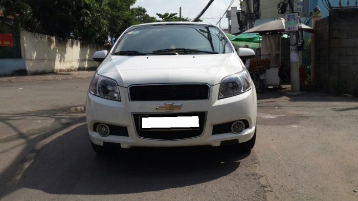 Em bán Aveo 2016 Lt số sàn màu trắng sữa