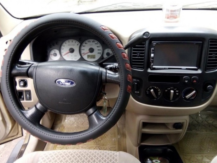 Bán xe Ford Escape 2006 số tự động màu nâu vàng, 2 cầu máy xăng,