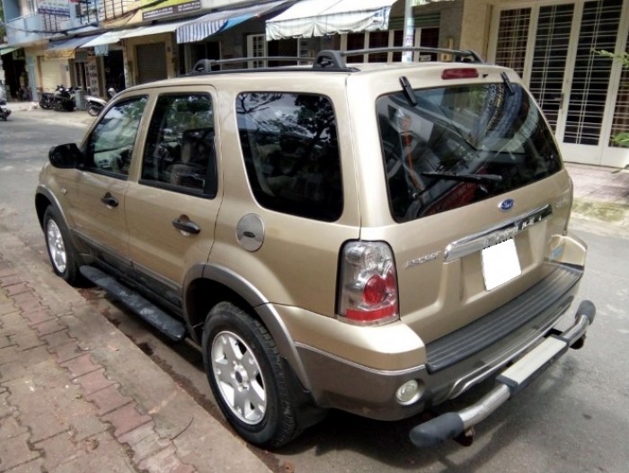 Bán xe Ford Escape 2006 số tự động màu nâu vàng, 2 cầu máy xăng,