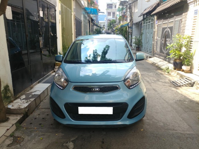 Gia đình cần bán morning LX, số sàn, màu xanh và đăng ký 2015 bản 1.25