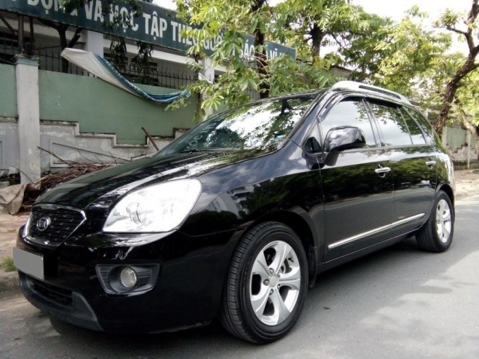 Bán nhanh Kia Carens 2016 số sàn màu đen xe gia đình giữ kỹ.