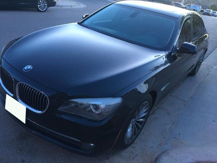 Lên đời cần bán rẻ xe BMW 750li nhập mỹ,đời 2011 màu đen nhám full option
