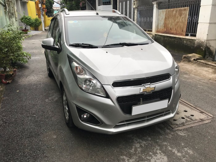 Cần bán xe Chevrolet Spark LT 1.2 màu bạc 2016 số sàn