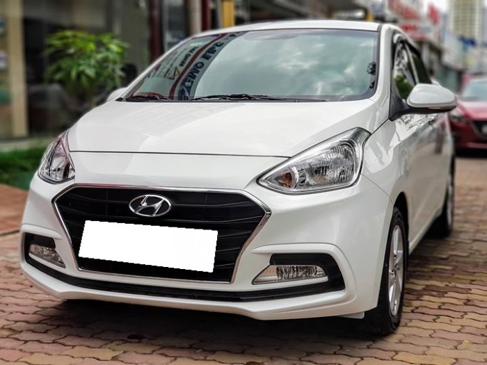 Gia đình cần bán I10 sx 2018, số tự động 1.25 sadan, màu trắng tinh siêu đẹp