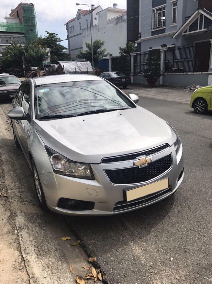 Bán xe Chevrolet Cruze đời 2013 số sàn màu bạc,xe zin đẹp bao lỗi