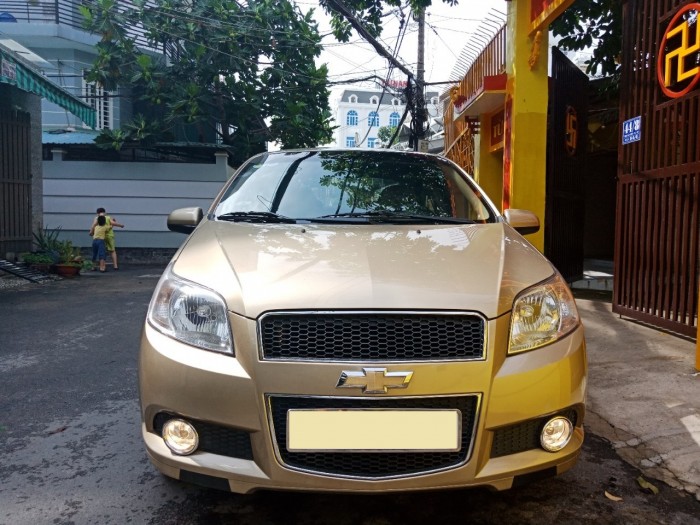 Cần bán con Chevrolet Aveo 2017 LT số sàn màu vàng cát