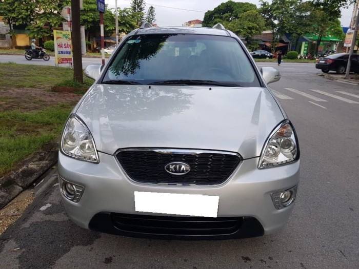 Cần bán Kia Carens, sx 2014. số sàn, bản 2.0 , màu bạc gia đình sử dụng