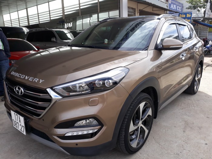 Bán Hyundai Tucson Turbo 1.6AT màu vàng cát máy xăng sản xuất 2017 chạy đúng 27000km