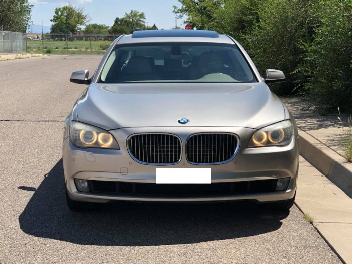 Bán xe BMW 750 Li 2011 màu vàng cát, nhập mỹ full option