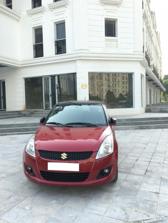 Cần bán gấp xe Suzuki Swift 2016,màu đỏ đô số tự động full option