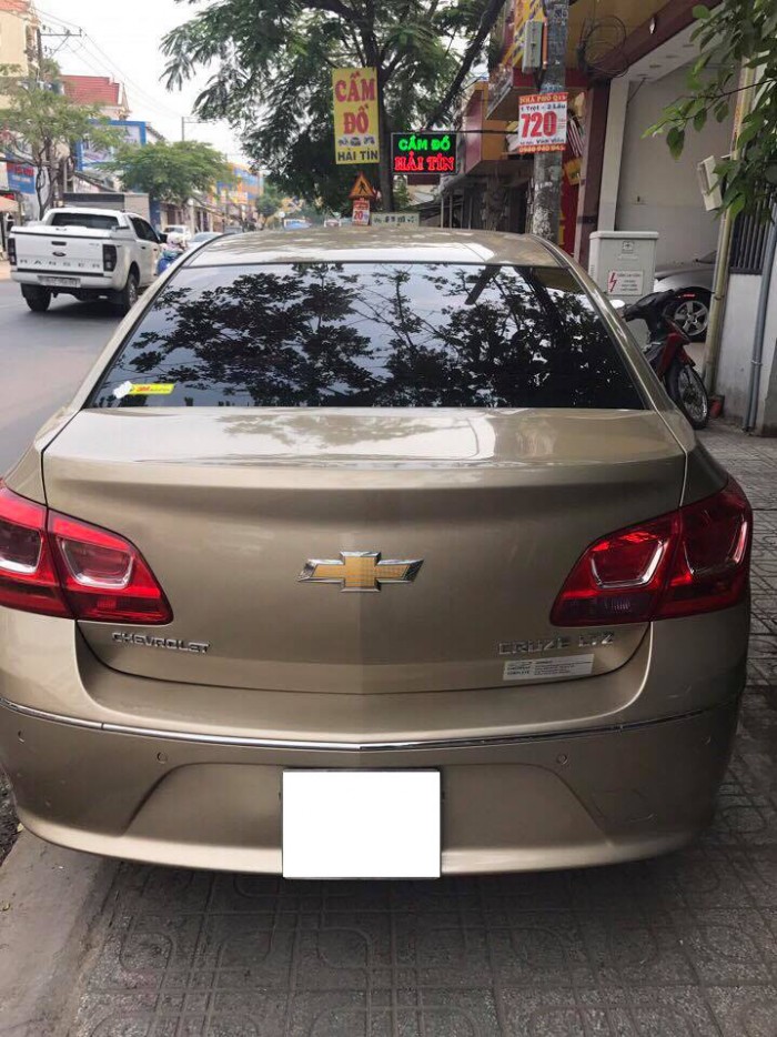 Cần tiền bán gấp Chevrolet Cruze 2016 Ltz .  Xe màu vàng cát