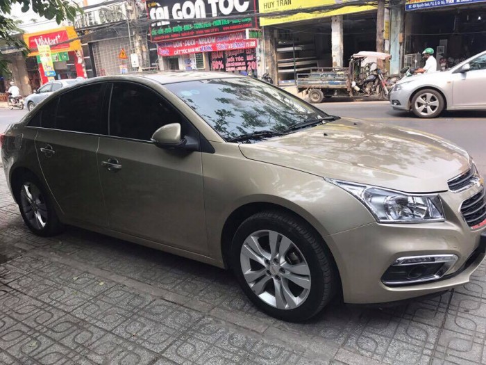 Cần tiền bán gấp Chevrolet Cruze 2016 Ltz .  Xe màu vàng cát