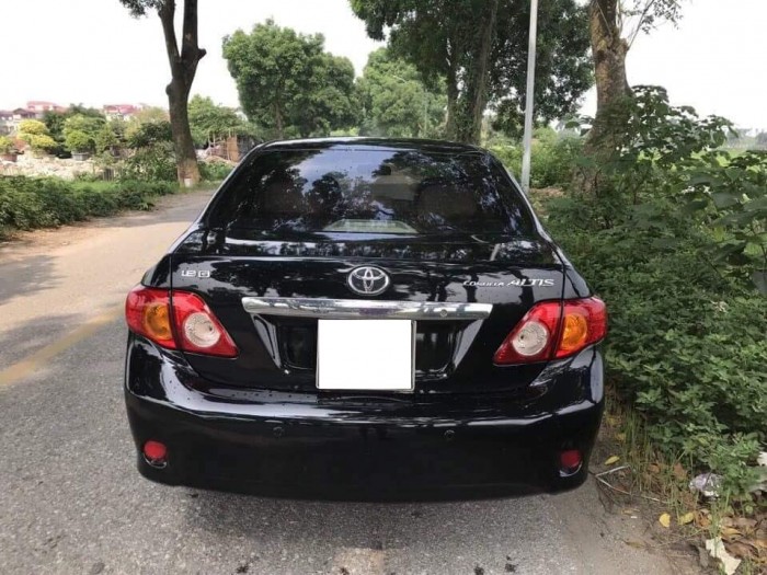Cần bán gấp Toyota Altis 2009 số sàn màu đen