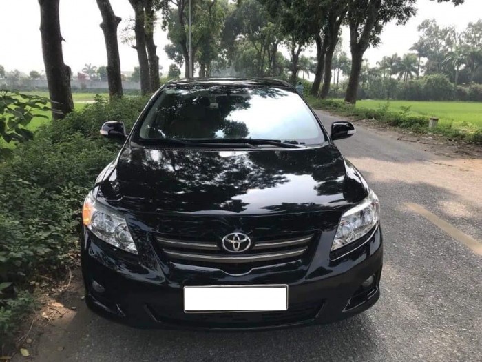 Cần bán gấp Toyota Altis 2009 số sàn màu đen
