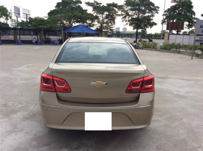 Bán nhanh Chevrolet Cruze 2015 màu vàng cát. Xe số sàn