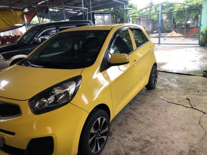 Cần bán gấp Kia Morning 2015 số sàn.Xe màu vàng,mâm đúc