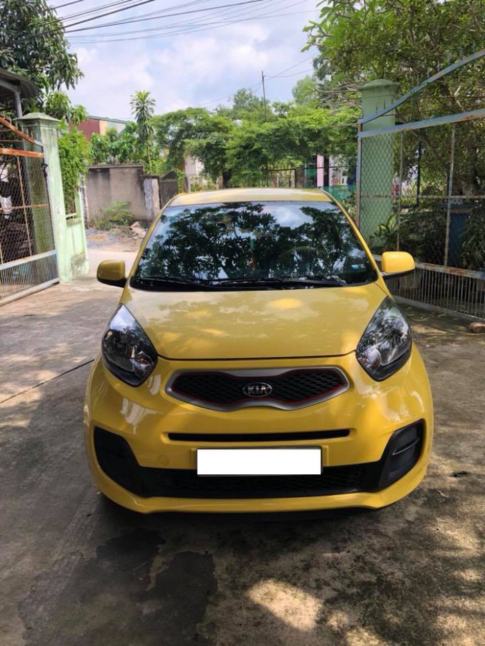 Cần bán gấp Kia Morning 2015 số sàn.Xe màu vàng,mâm đúc