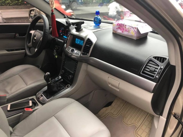Chevrolet Captiva 2015 số sàn màu Vàng cát xe đi 23000km