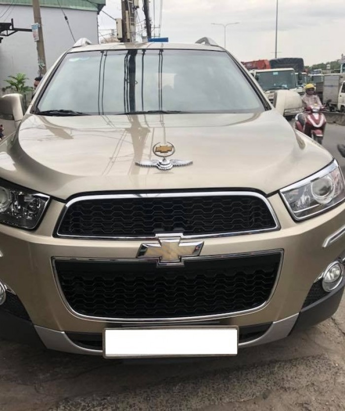 Chevrolet Captiva 2015 số sàn màu Vàng cát xe đi 23000km