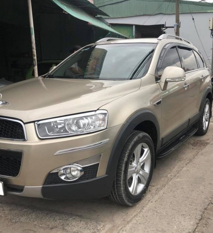 Chevrolet Captiva 2015 số sàn màu Vàng cát xe đi 23000km