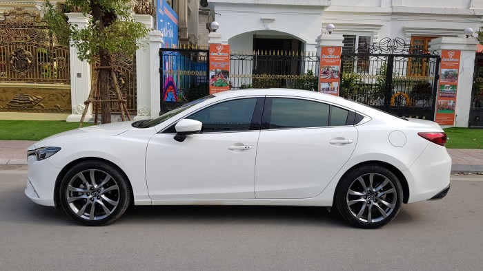 Cần tiền gấp bán xe Mazda 6 trắng ngọc trinh
