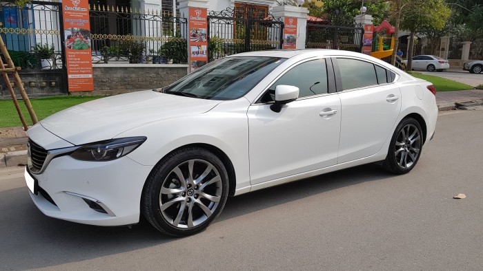 Cần tiền gấp bán xe Mazda 6 trắng ngọc trinh