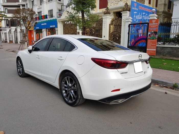 Cần tiền gấp bán xe Mazda 6 trắng ngọc trinh