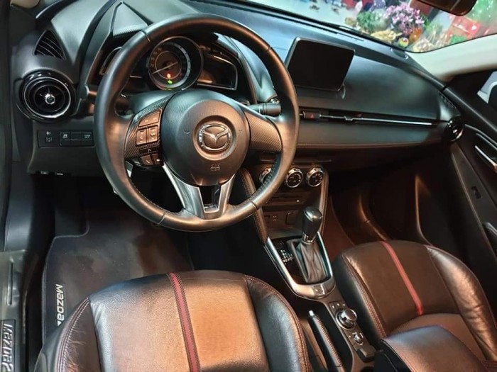 Cần tiền bán gấp Mazda 2 2016 số tự động . Xe màu trắng
