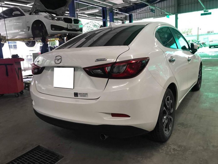 Cần tiền bán gấp Mazda 2 2016 số tự động . Xe màu trắng