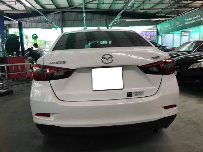Cần tiền bán gấp Mazda 2 2016 số tự động . Xe màu trắng