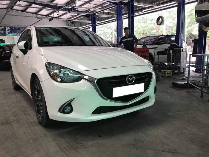 Cần tiền bán gấp Mazda 2 2016 số tự động . Xe màu trắng