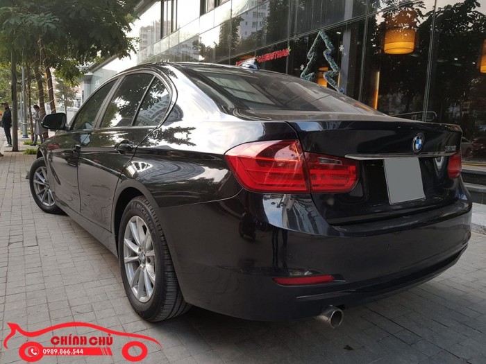 Bán BMW 320i 2.0L màu đen, model 2013, xe mua mới từ đầu