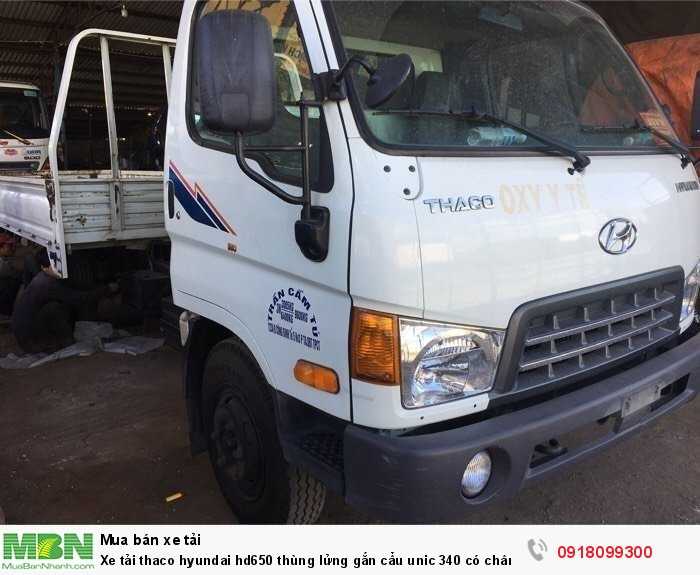 Xe tải thaco hyundai hd650 thùng lửng gắn cẩu unic 340 có chân sau