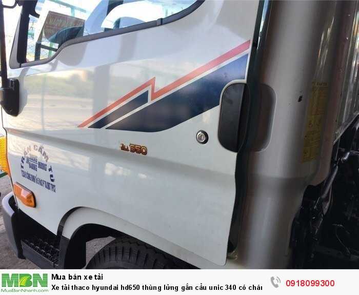 Xe tải thaco hyundai hd650 thùng lửng gắn cẩu unic 340 có chân sau