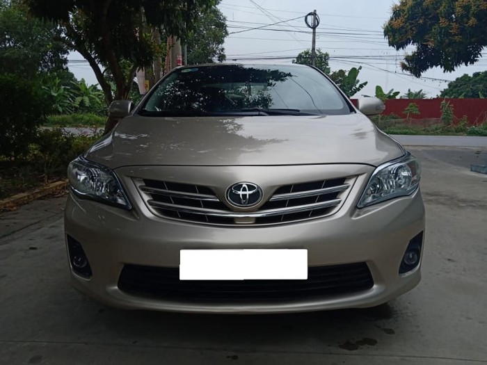 Gia đình cần bán Altis 2011, số tự động, bản 2.0 full nút đề, màu vàng cát