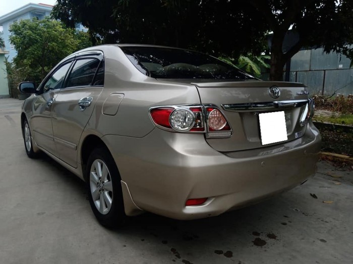 Gia đình cần bán Altis 2011, số tự động, bản 2.0 full nút đề, màu vàng cát