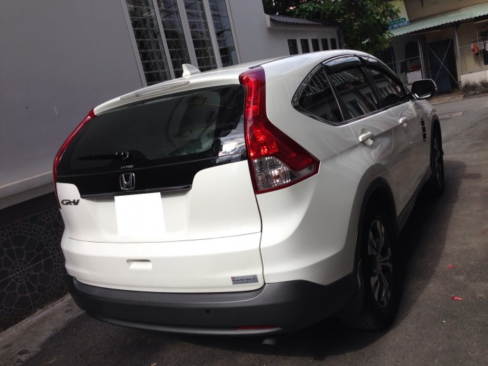 Bán Honda Crv 2.4AT 2015 bản full màu trắng sài kĩ mới 99% bstp