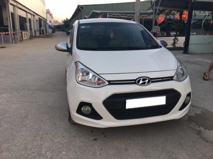 Cần bán xe Hyundai Grand i10 đời 2016 số sàn màu trắng