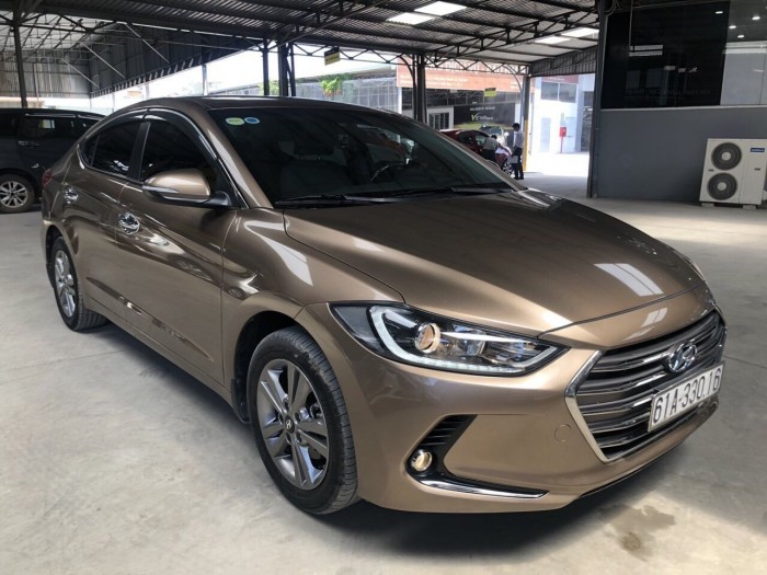 Bán Hyundai Elantra GLS 1.6AT màu nâu titan số tự động sản xuất 2016 biển Bình Dương đi 33000km