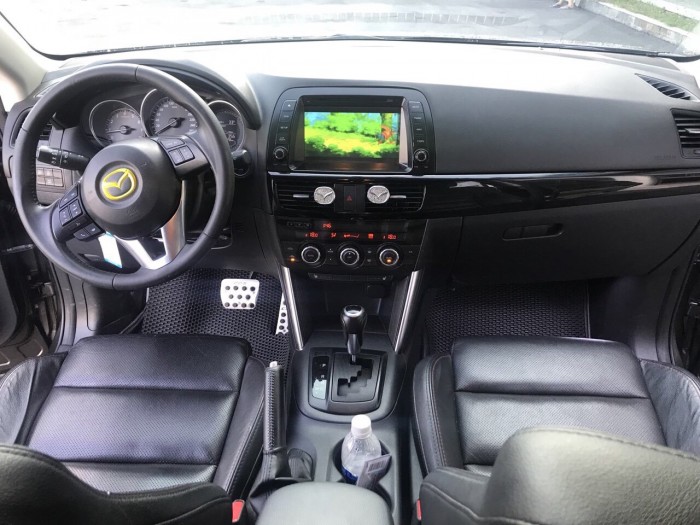 Bán Mazda CX-5 2.0AT màu nâu Titan số tự động sản xuất 2015 một chủ