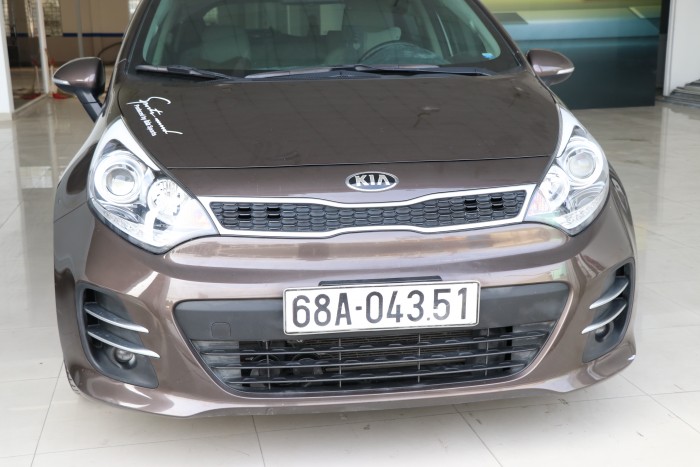 Bán Kia Rio 5 cửa 1.4AT màu nâu titan số tự động nhập Hàn Quốc 2015 đk 2016