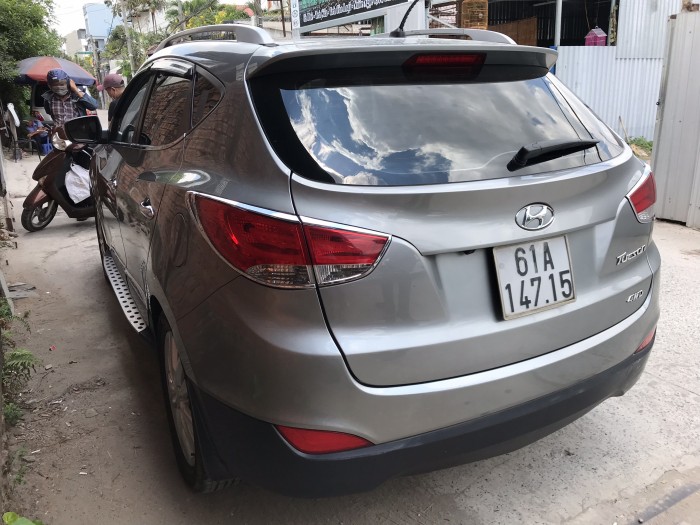 Bán Hyundai Tucson 4WD 2.0AT màu xám số tự động nhập Hàn Quốc 2011 biển Bình Dương