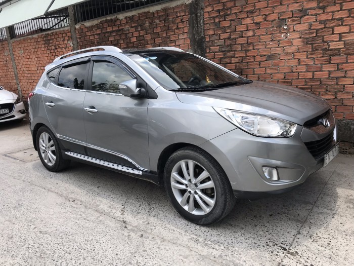 Bán Hyundai Tucson 4WD 2.0AT màu xám số tự động nhập Hàn Quốc 2011 biển Bình Dương