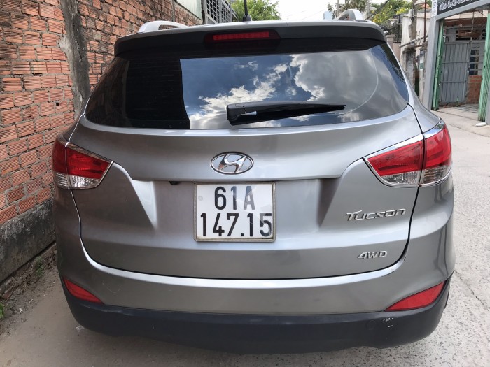 Bán Hyundai Tucson 4WD 2.0AT màu xám số tự động nhập Hàn Quốc 2011 biển Bình Dương