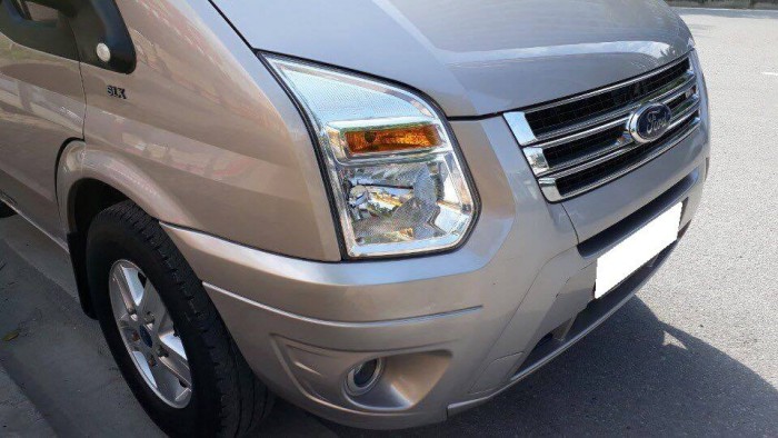 Bán Ford Transit 2018 máy dầu bảng giữa mâm đúc màu bạc xe zin cọp.