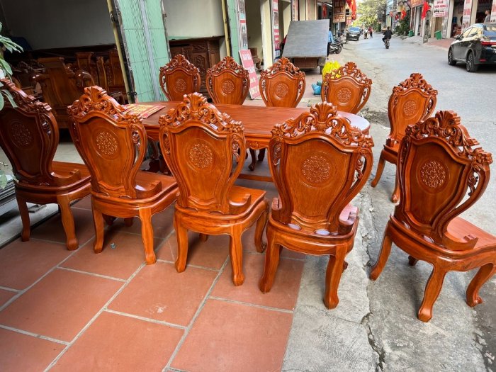 Bộ bàn ghế ăn vòm 10 ghế đục 2 mặt hoa lá tây ván tràn gỗ gõ đỏ1