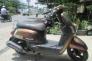 Chiếc xe Yamaha Cuxi Fi, màu nâu hình thật