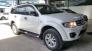Bán Mitshubisi Pajero Sport 2.5MT màu trắng số sàn máy dầu sản xuất 2016 biển Sài Gòn